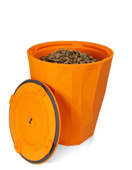 Fresh dog kibble visible inside open orange CrocketBox pet food storage.